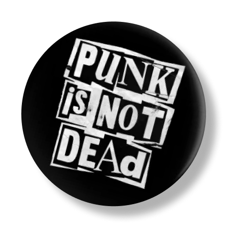 A black metal pin with the phrase Punk is Not Dead printed on it.