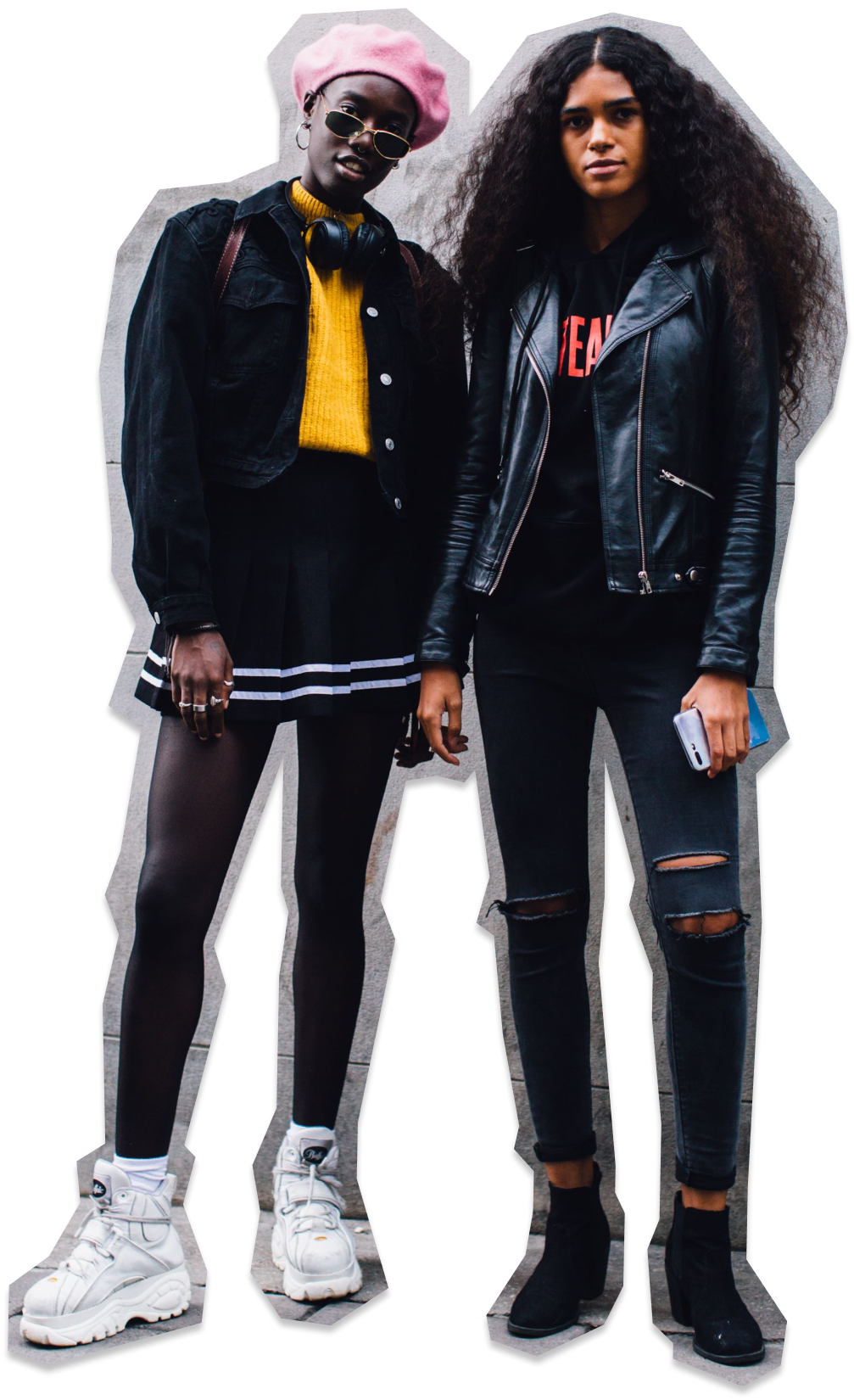 An image of two young black women dressed in punk outfits.